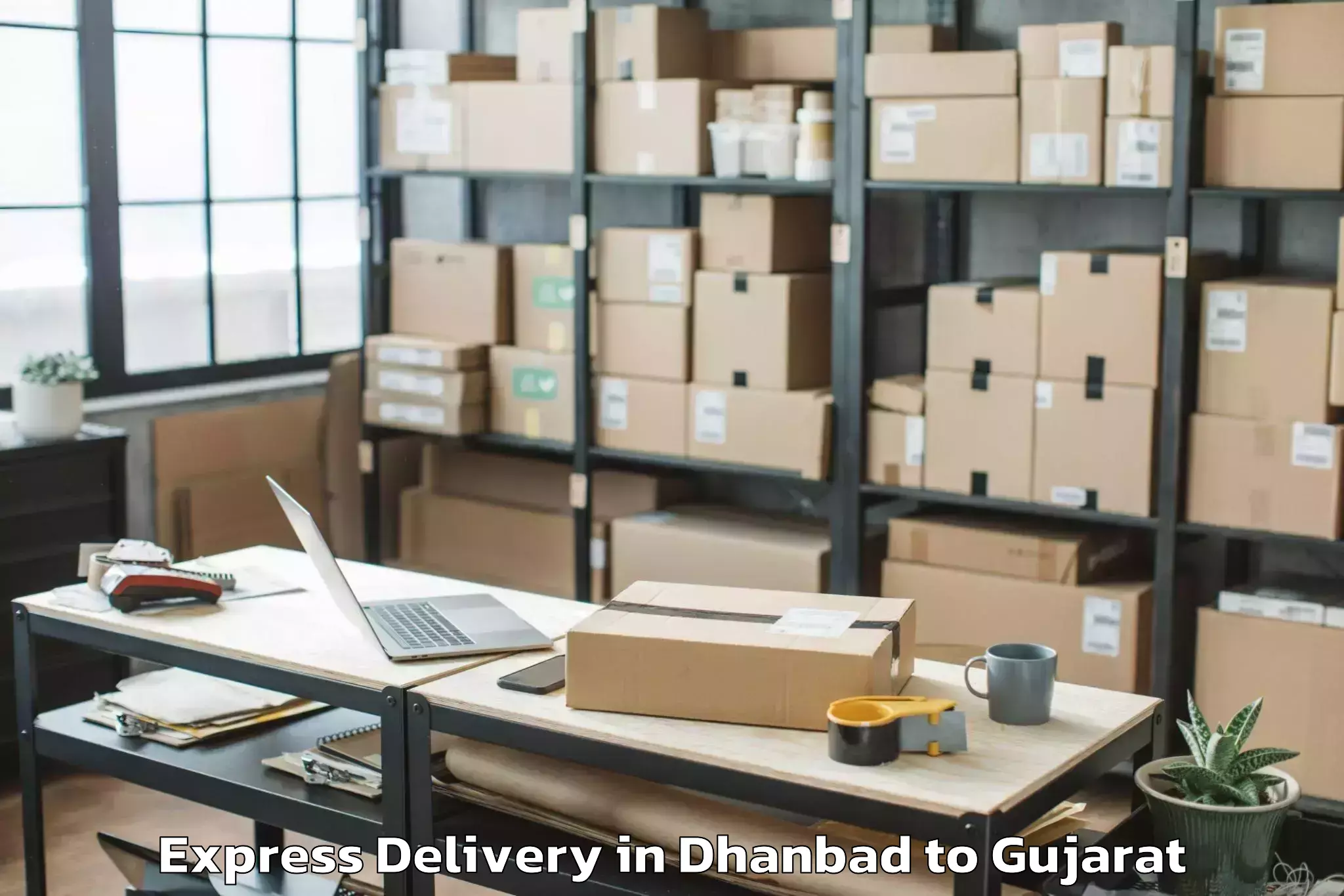 Top Dhanbad to Surat Express Delivery Available